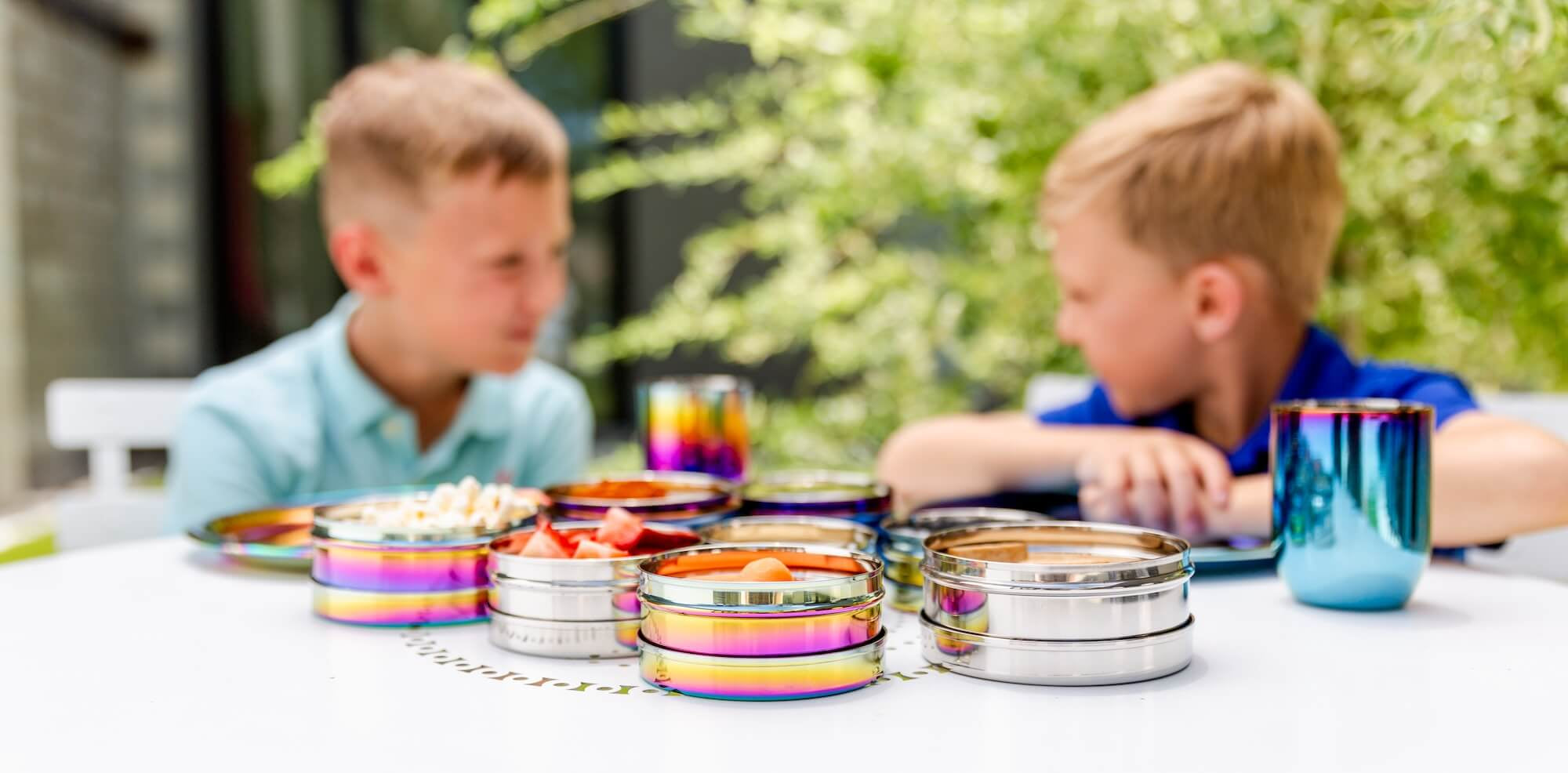 kids with stainless steel dishes