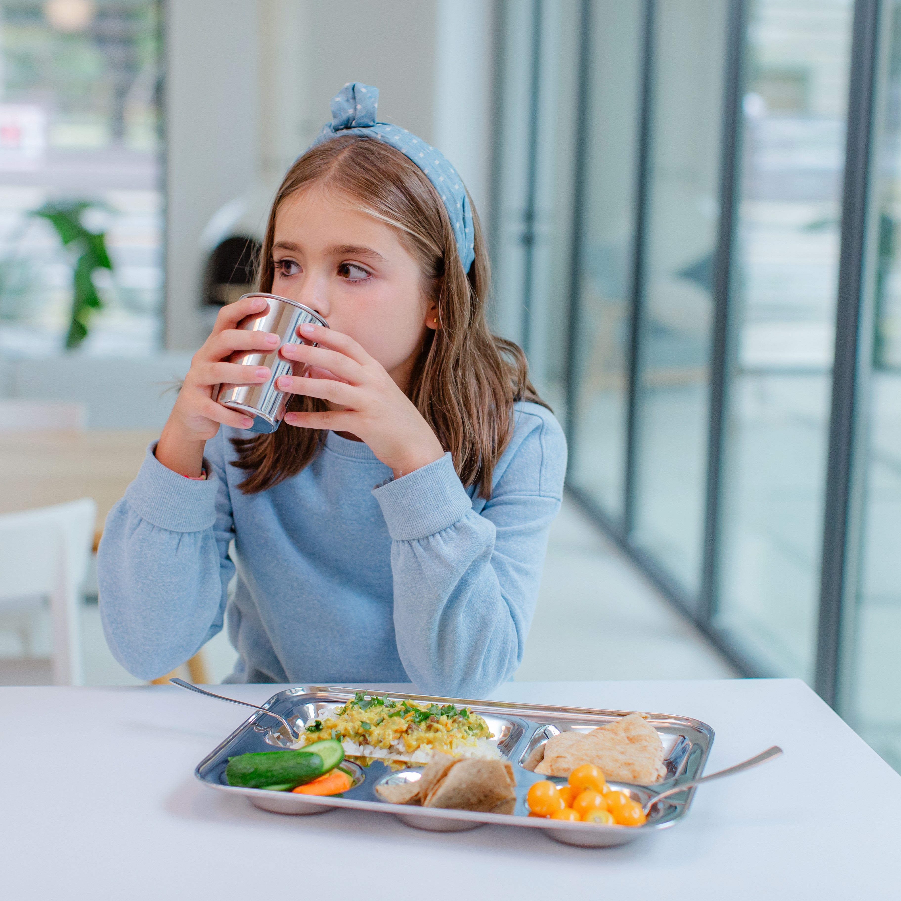 Stainless steel 10 oz cup with the cafeteria tray, fork, and spoon