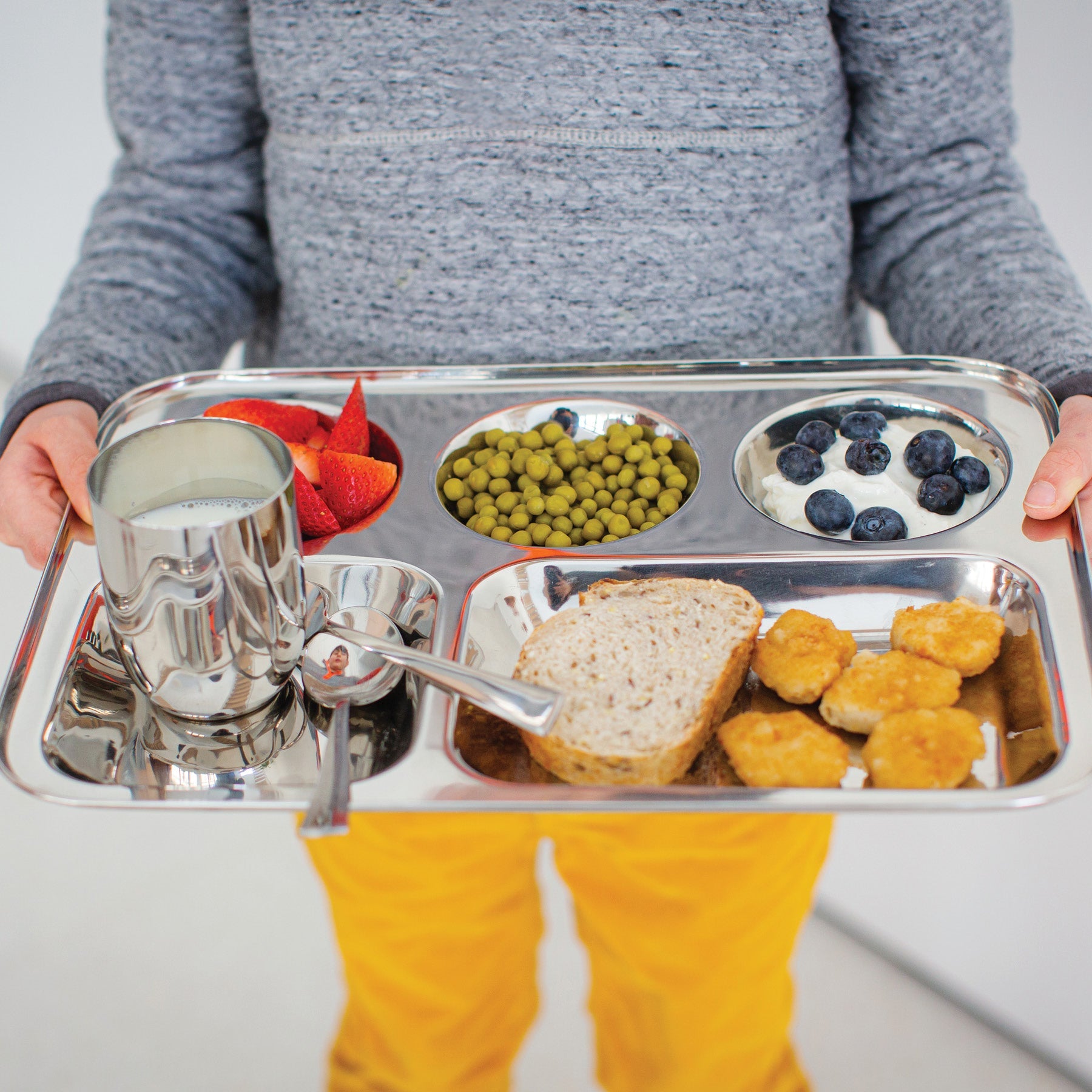 Green cafeteria and safe foodware - our stainless steel trays have rounded edges for safe holding.